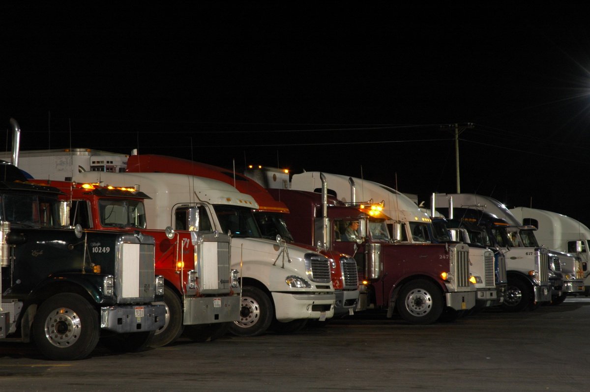 Parked semi truck at night stop during a sleeper berth break
