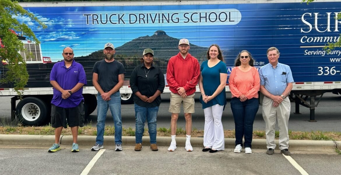 Student driver training in a tractor trailer at a South Carolina CDL school training yard