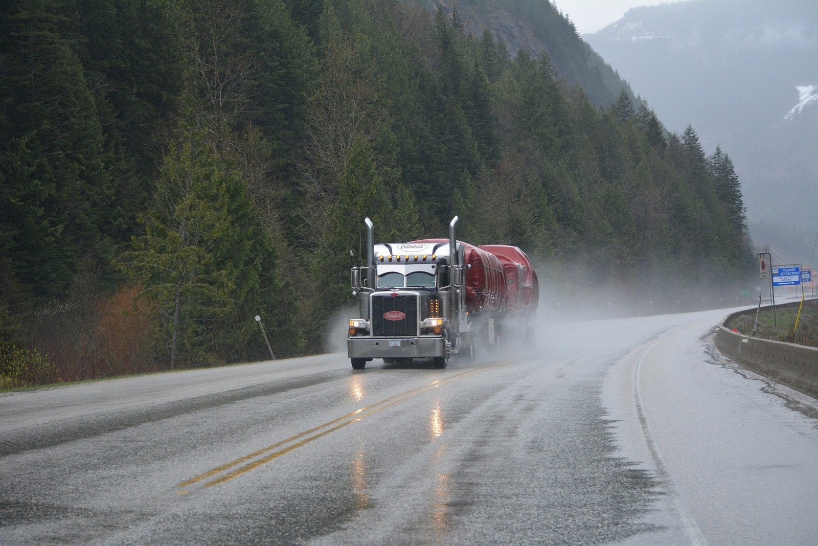 Commercial truck operating in wet and slippery Wisconsin conditions