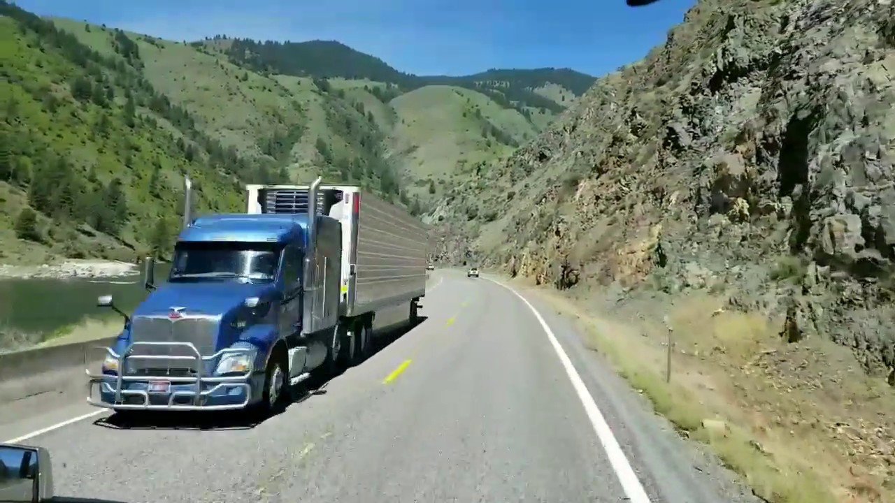 Commercial truck on a western highway for Idaho CDL applicants